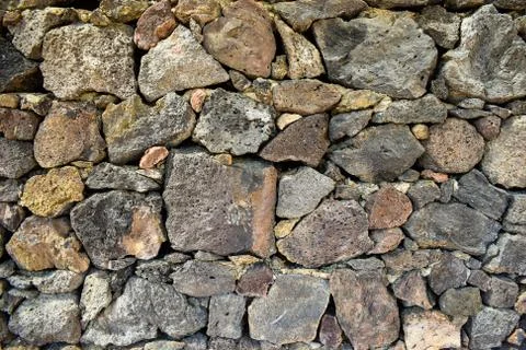 Stone wall texture, big rocks background, abstract Stock Photos