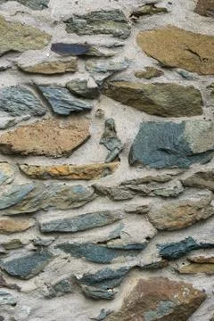 Stone wall texture with concrete. Stock Photos