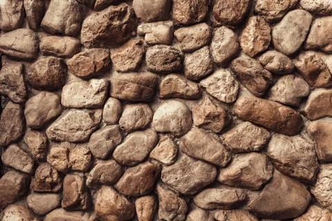Stone wall Texture of different forms stones similar to wall Stock Photos