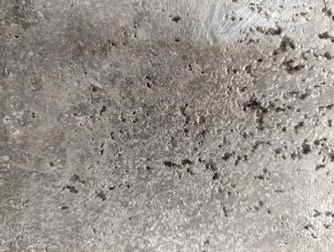 The Stone wall texture is gray with a medium level of roughness Stock Photos