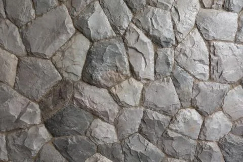 Stone wall texture with light from side Stock Photos