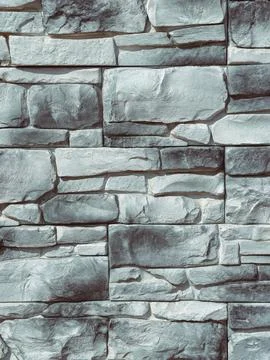Stone Wall Texture with Natural Stacked Stone Pattern and Gray Tones Copy Space Stock Photos