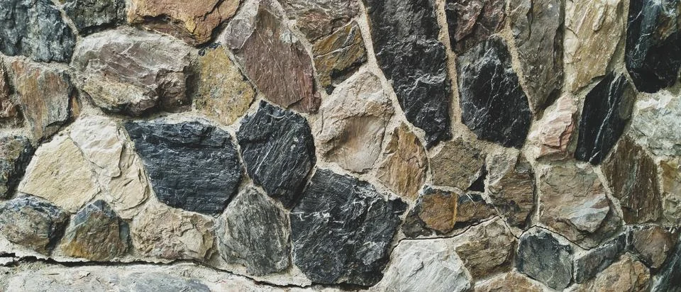 The stone wall texture pattern background. Stock Photos