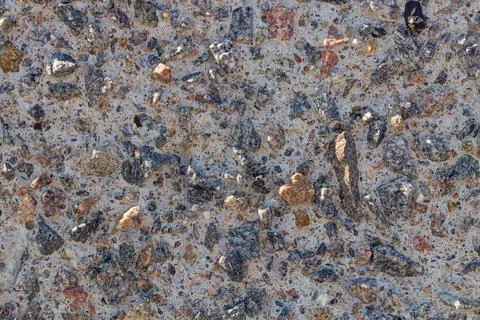 Stone wall texture. pieces of shells stick out of the stone. textured design Stock Photos