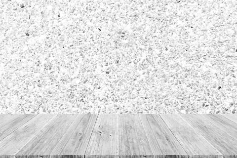 Stone wall texture , process in white color with wood terrace Foto stock
