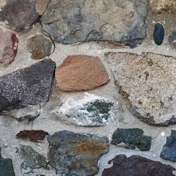 Stone wall texture Retro stone wall of large rough stones. Stone wall text... Stock Photos