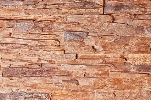 Stone wall texture with soft light, close-up Stock Photos