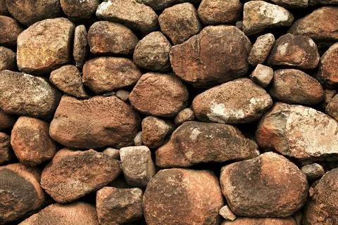 Stone wall, Texture of a stone wall. Stone wall texture background, rock wall Stock Photos
