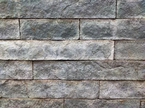 Stone wall, Texture of a stone wall. Stone wall texture background, rock wall Stock Photos