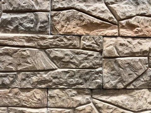Stone wall texture. Stone wall background for interior or exterior design. Stock Photos