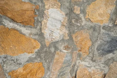 Stone wall, with textures as background Stock Photos