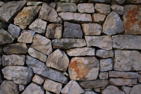 Stone wall of a trullo Stock Photos