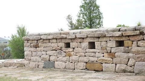 Stone wall in the village Видео 303551175
