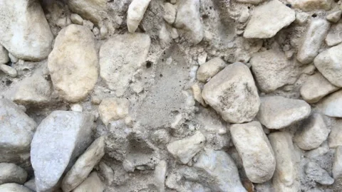 Stone wall - A wall of small white stones 動画素材 156331649