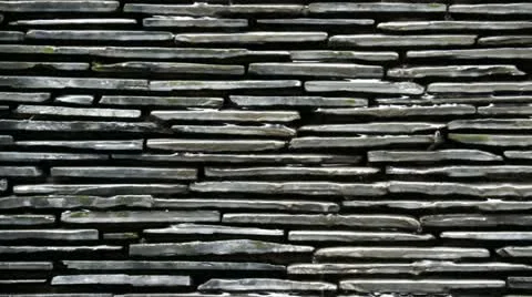 Stone Wall with Water Trickling Down the Surface Stock Footage 12302986