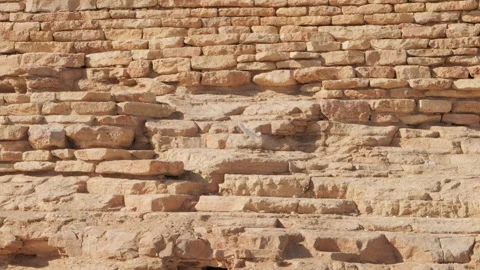 The stone wall that the white bird flew into. Stock Footage 268717994