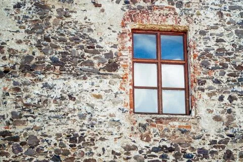 Stone wall with window, old wall, stone wall, castle palace Stock Photos