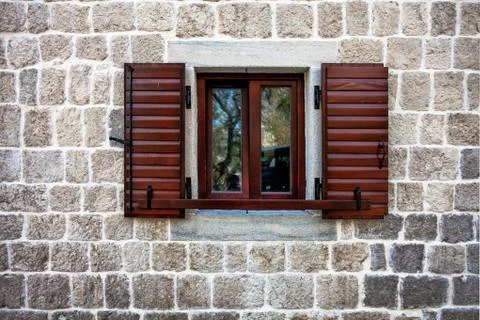 Stone wall with window Stock Photos