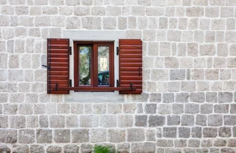 Stone wall with window Stock Photos