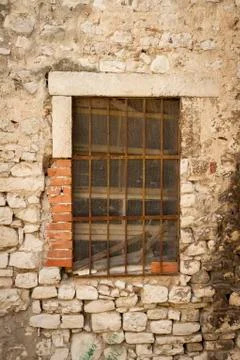 Stone wall with window Stock Photos