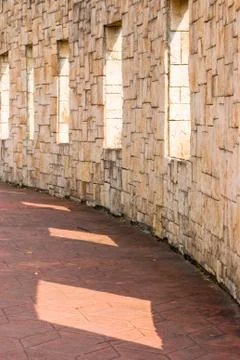 Stone wall with windows on it Stock Photos