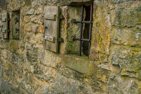 Stone wall with windows Stock Photos