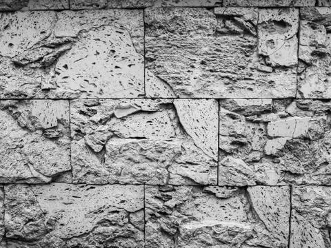 Stone wall without joints black and white Stock Photos