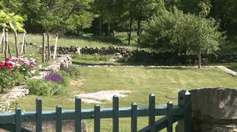 Stone walled garden Stock Footage 10786313