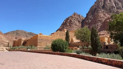 Stone walls and path leading toward mountain monastery Stock Footage 341452278