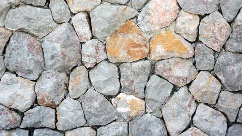 Stone walls for a background. Stock Photos