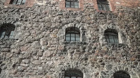 Stone walls of a medieval castle outside Stock Footage 238004942
