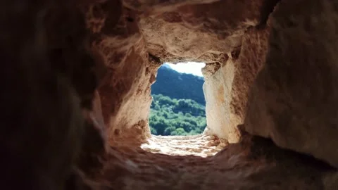 Stone war tower window with motion blurred bird and sea coast view. Stock Footage 226739253