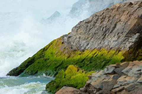 Stone in waterfall in Laos. Stock Photos