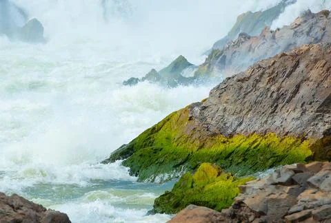 Stone in waterfall in Laos. Stock Photos