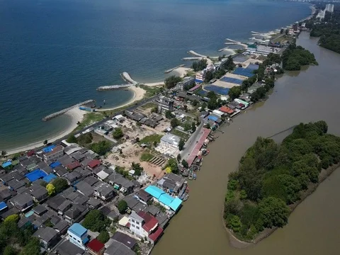 Stone wave breaker into the sea at Map ta phut Industrail Estate, Rayong Stock Footage 77443416