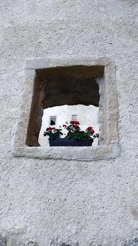 Stone window on an old ruin Stock Photos