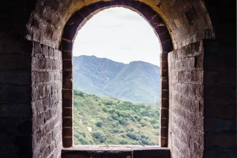 Stone window with a view of the mountain Stock Photos