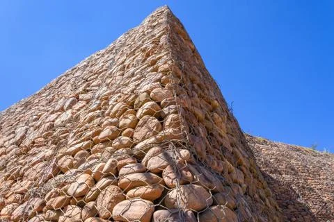 Stone Wire Cage Wall Stock Photos