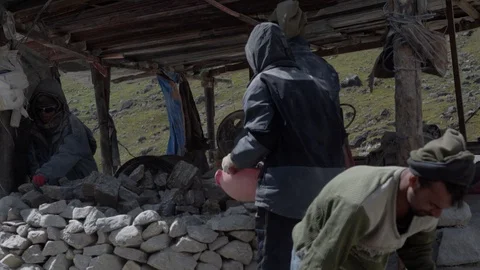 Stone work by labor of India Stock Footage 122922843