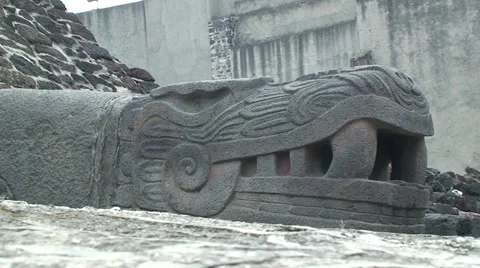 Stone Znake Head of Aztec God Quetzalcoatl in Tenochtitlan Ruins, Mexico City Video stock 47932090
