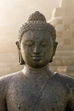 Stoned image of buddha at borobudur Stock Photos