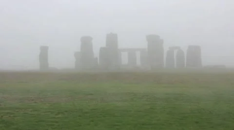 Stonehenge in the fog, England Stock Footage