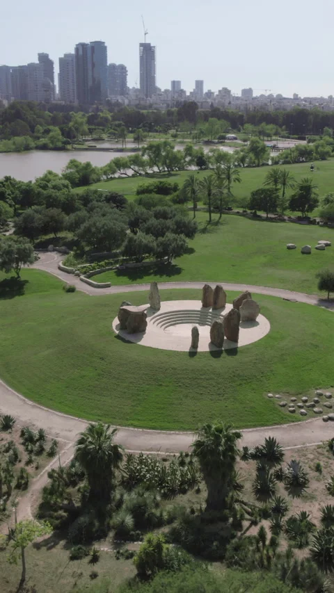 Stonehenge small model parallax Vertical video shot inside Rock Garden Israel Stock Footage 311098025