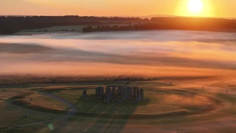 Stonehenge Summer Solstice, Stunning Misty Orange Sunrise, Drone 4K  Stock Footage 331737191