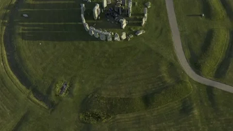 Stonehenge top down across the stone circle, green fields and sun shadows. Stock Footage 202109514