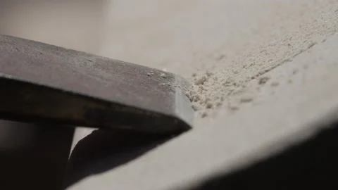 Stonemason Carves Stone With Chisel - Macro Stock Footage 239436409