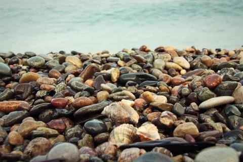 Stones background on the beach Stock Photos