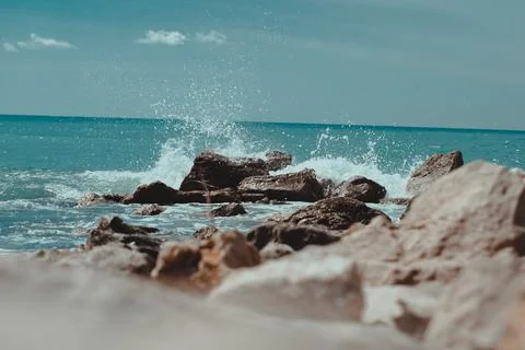 Stones on the background of the waves Foto stock