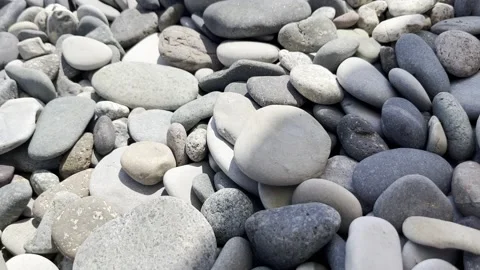 Stones on the beach, shadow Video stock 203727742