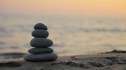 Stones on the beach at sunset 스톡 동영상 38284187